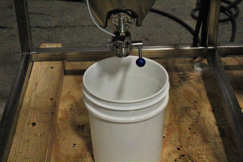 Bucket Under THC Remediation Reactor Drain Valve