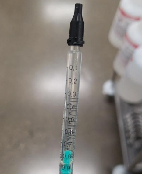 THC distillate in syringe